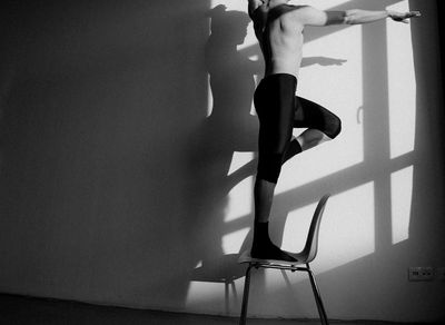 A balancing pose demonstrated with grace and stability.