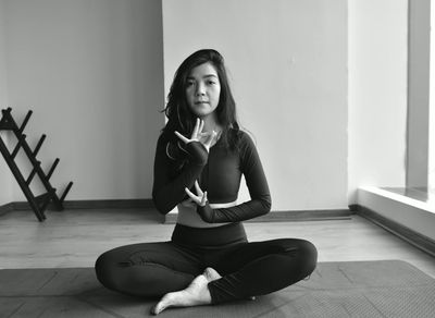 An empty, serene yoga studio space with natural light.